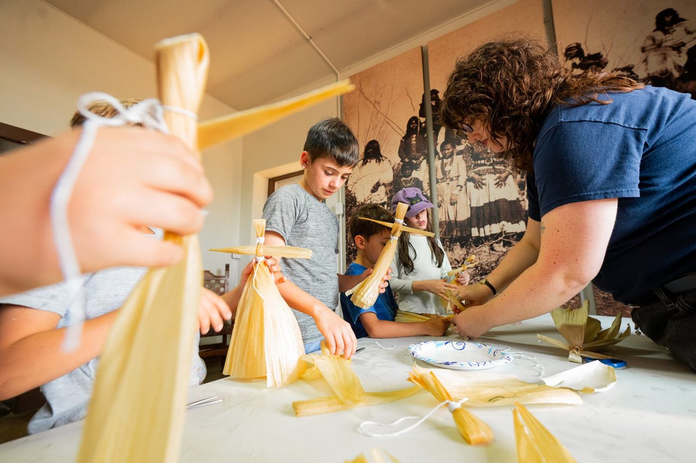 Campers in a hands-on craft workshop